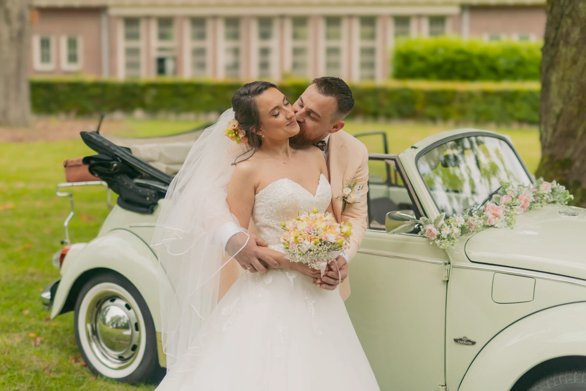 Bride in lace gown with soft bridal makeup and hairstyling by Natali Hehenkamp